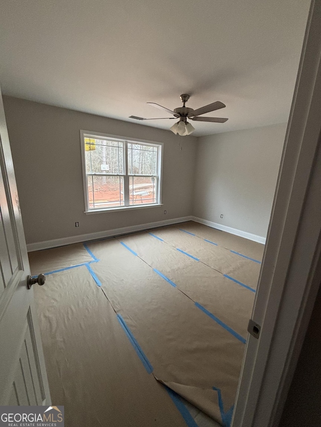 spare room featuring ceiling fan