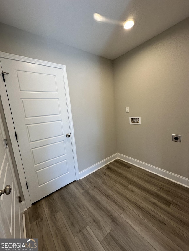 laundry area featuring baseboards, hookup for an electric dryer, dark wood finished floors, laundry area, and washer hookup