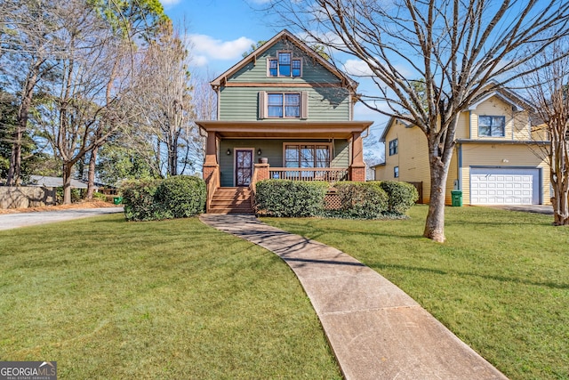 view of front of house with a garage, covered porch, and a front lawn