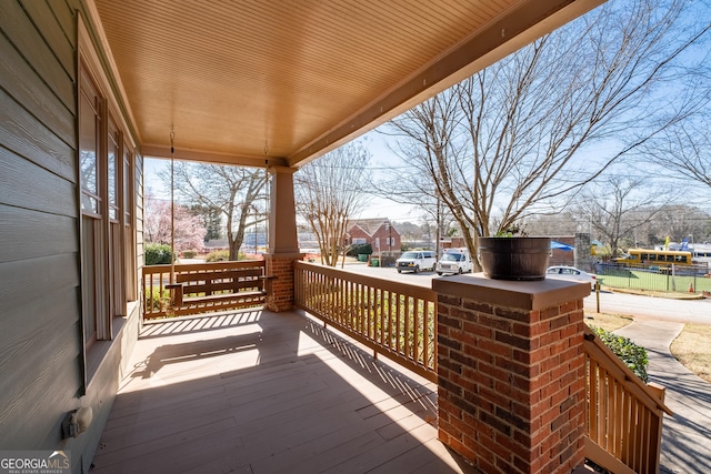 wooden deck with a porch