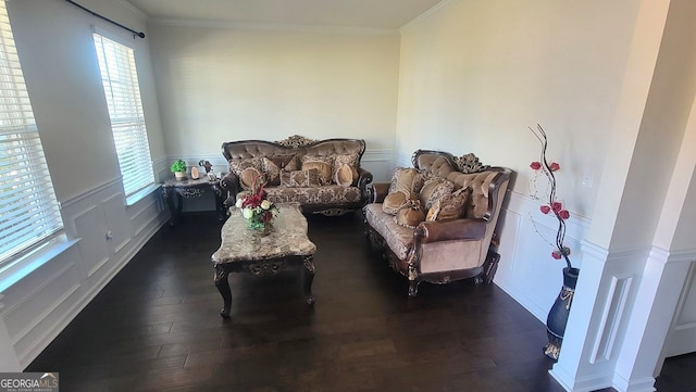 7157 Gladstone, Stonecrest, GA 30038 - living area featuring dark wood finished floors, a decorative wall, wainscoting, and crown molding