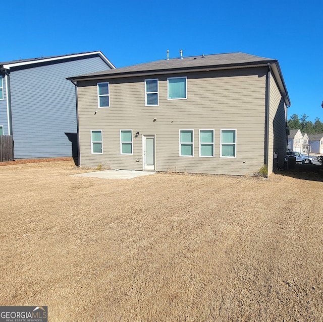 rear view of property with a patio