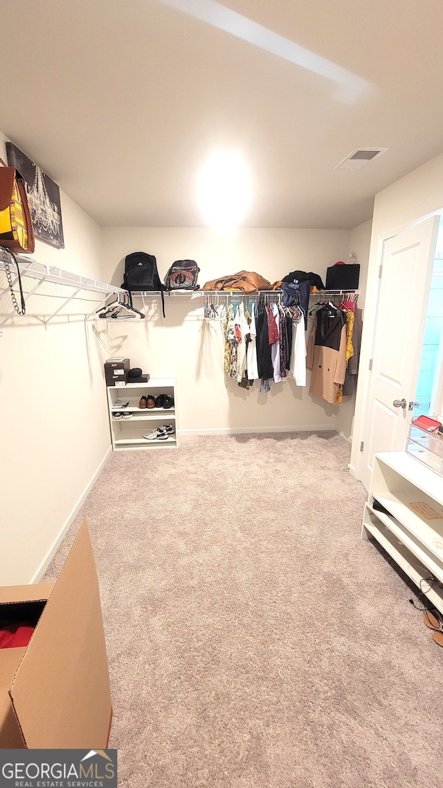 7157 Gladstone, Stonecrest, GA 30038 - walk in closet featuring carpet floors and visible vents