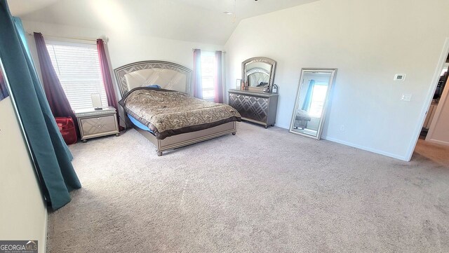 7157 Gladstone, Stonecrest, GA 30038 - carpeted bedroom featuring lofted ceiling, multiple windows, and baseboards