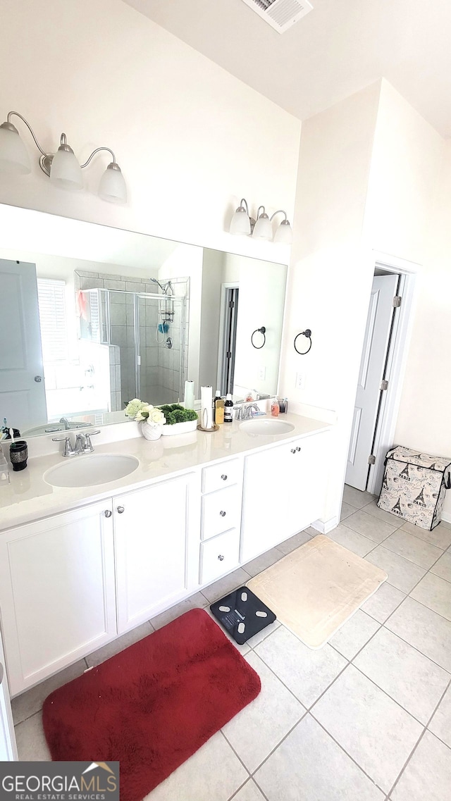 7157 Gladstone, Stonecrest, GA 30038 - full bathroom featuring double vanity, a shower stall, and tile patterned flooring