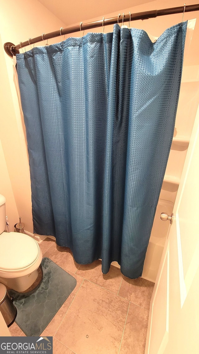 7157 Gladstone, Stonecrest, GA 30038 - bathroom with a shower with curtain, toilet, and tile patterned floors