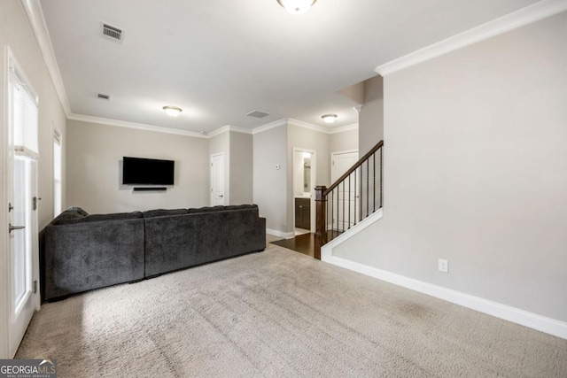 carpeted living room featuring crown molding