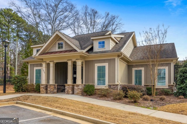 craftsman-style home with covered porch