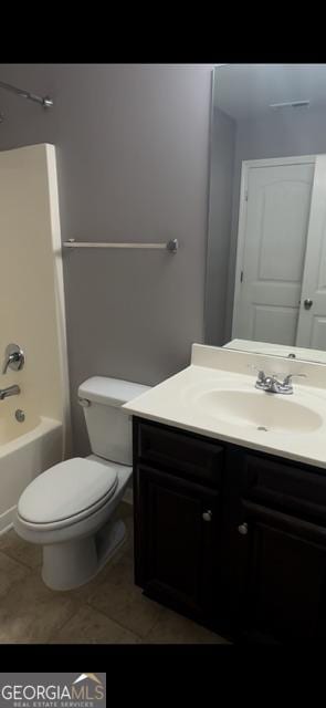 full bathroom with vanity, tile patterned floors, bathing tub / shower combination, and toilet