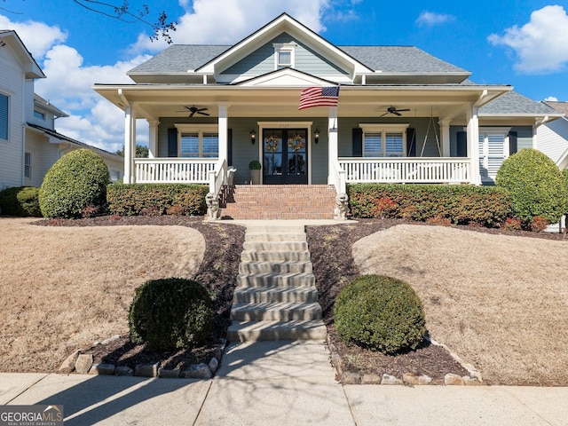 bungalow-style house featuring a porch and ceiling fan