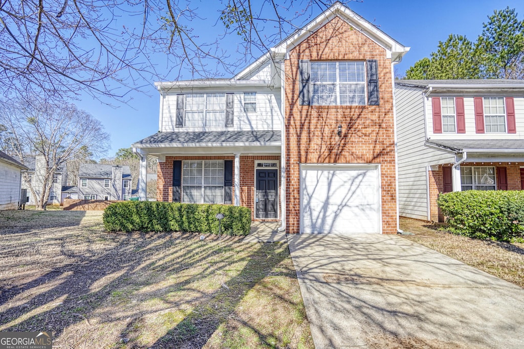 2413 Charleston Pointe Ct SE, Atlanta, GA 30316 - view of front of house featuring a garage
