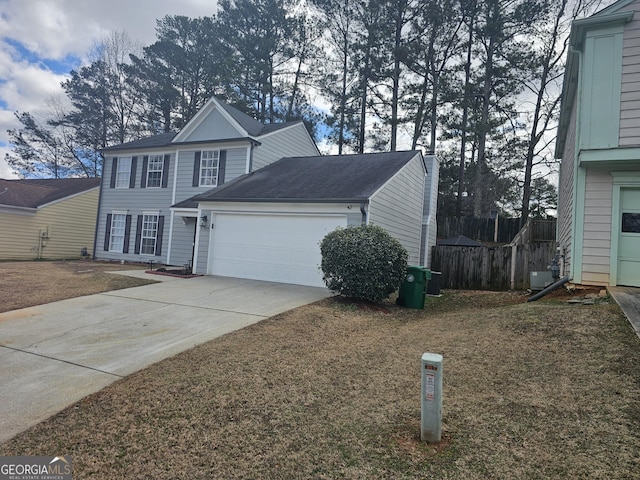 view of front of home with a garage, central AC, and a front lawn