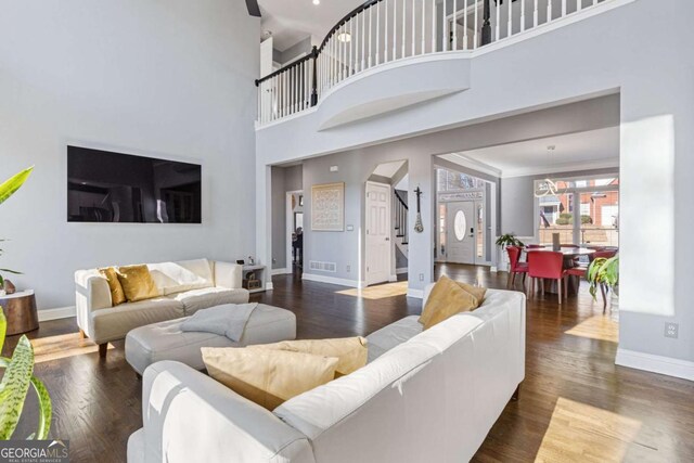1331 Dayspring Trce, Lawrenceville, GA 30045 - living room with dark hardwood / wood-style floors and a high ceiling