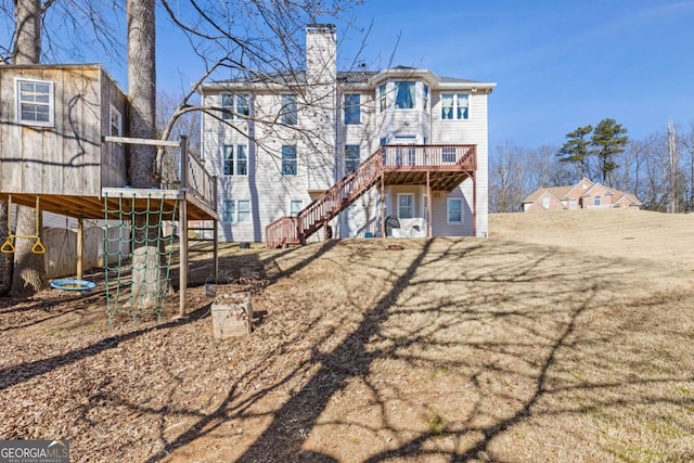 1331 Dayspring Trce, Lawrenceville, GA 30045 - back of property with a wooden deck