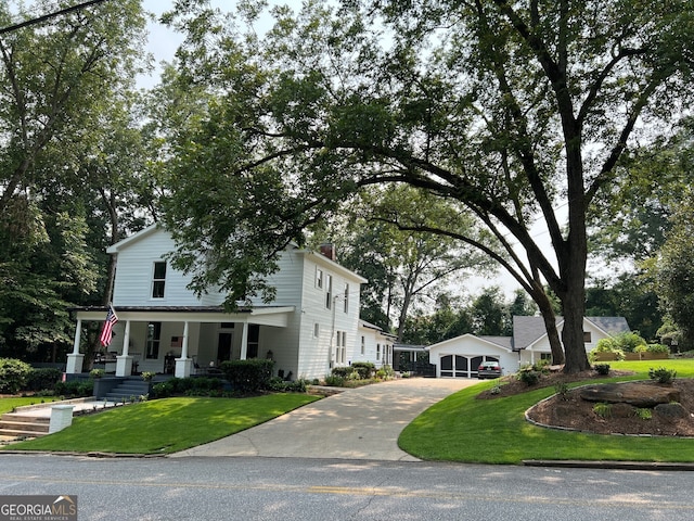 view of front of house with a porch and a front yard