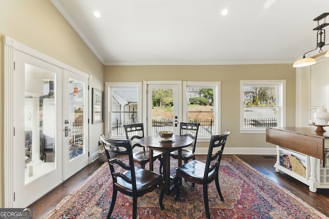 dining room with baseboards, french doors, dark wood-style floors, and crown molding