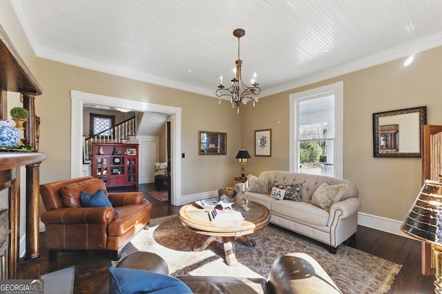 living room featuring baseboards, dark wood-type flooring, stairway, and crown molding