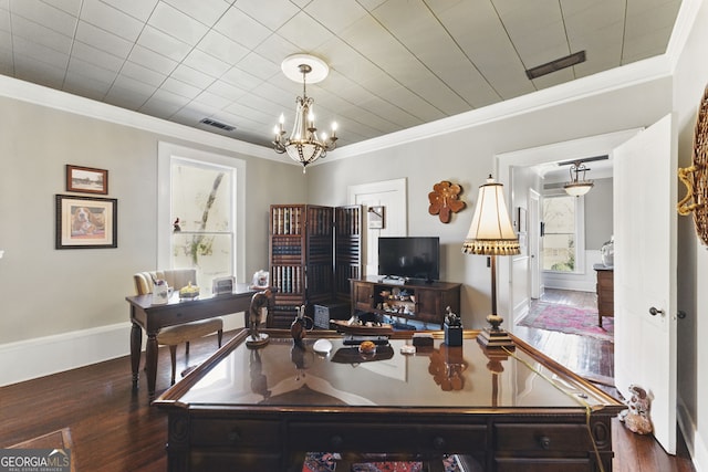 office featuring crown molding, baseboards, and wood finished floors