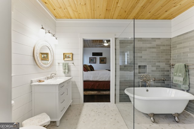 full bath featuring wooden ceiling, ensuite bath, tile patterned flooring, a freestanding bath, and vanity