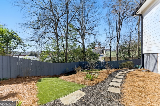 view of yard featuring a fenced backyard