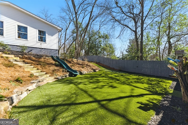 view of yard featuring fence