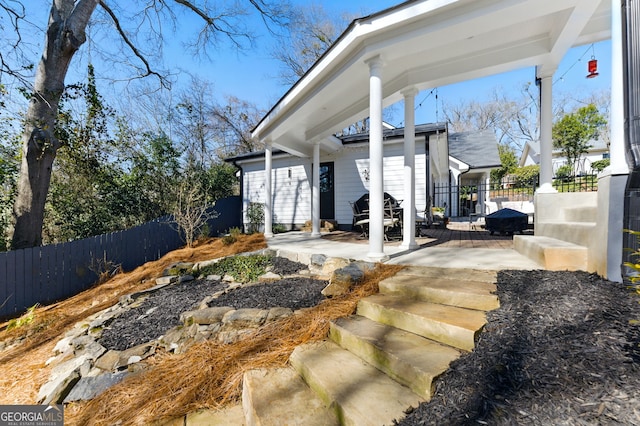 view of patio / terrace with fence