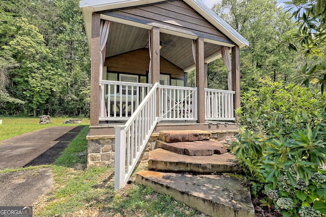 doorway to property with covered porch