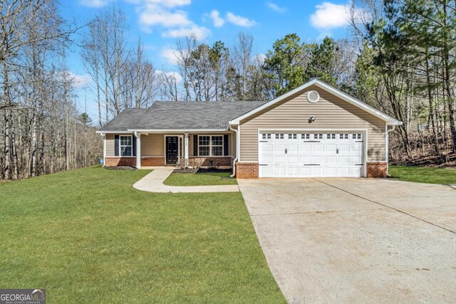 ranch-style house with a garage, a porch, and a front yard