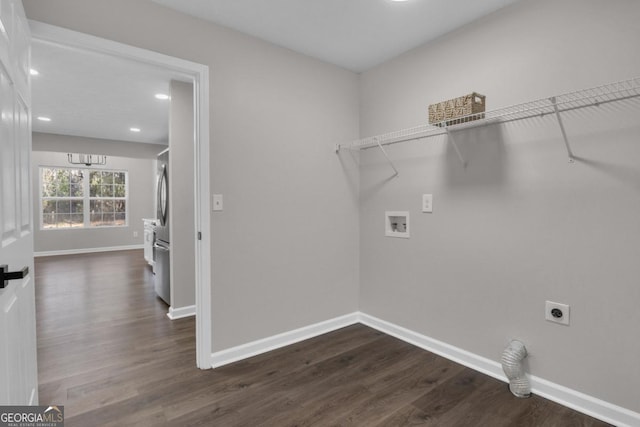 unfurnished bedroom with dark hardwood / wood-style flooring and a closet