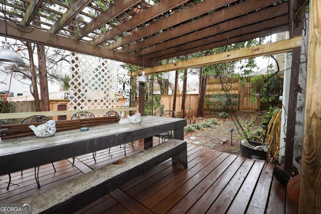 wooden terrace with a pergola