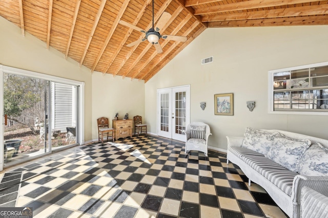 interior space with high vaulted ceiling, wood ceiling, french doors, and baseboards