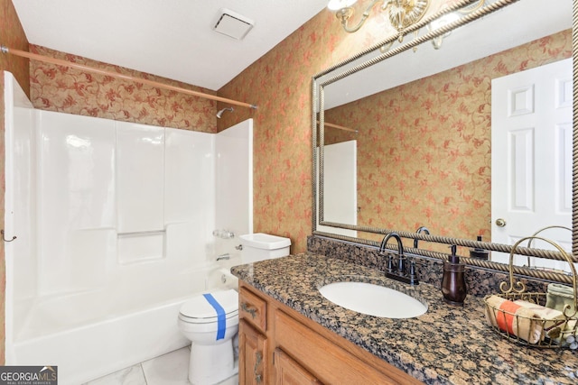 bathroom featuring  shower combination, vanity, toilet, and wallpapered walls