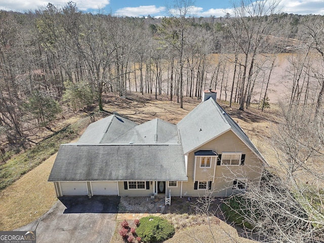 drone / aerial view with a forest view