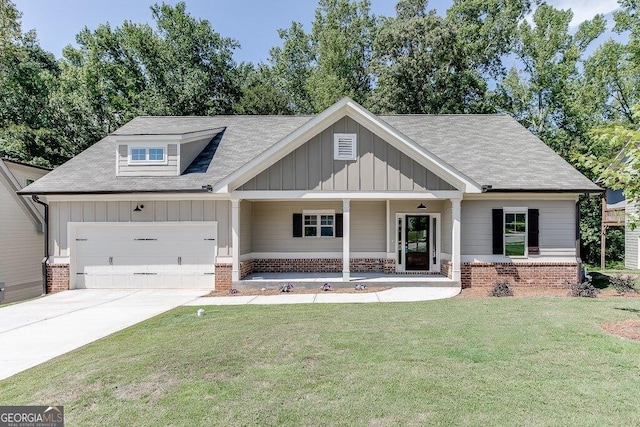 craftsman-style house with a porch, a garage, and a front lawn