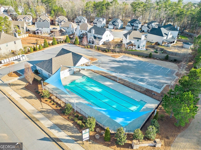 view of pool featuring a residential view