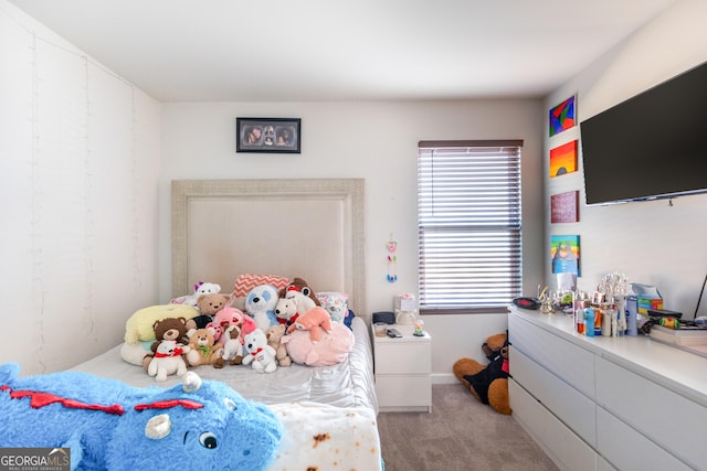 bedroom with light colored carpet