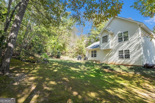 exterior space featuring a lawn