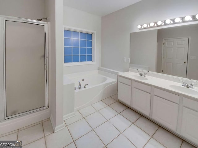 bathroom featuring tile patterned flooring, vanity, and independent shower and bath