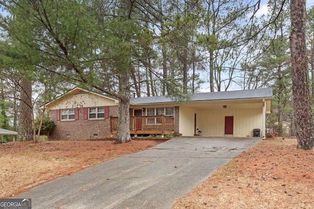 ranch-style house with a carport