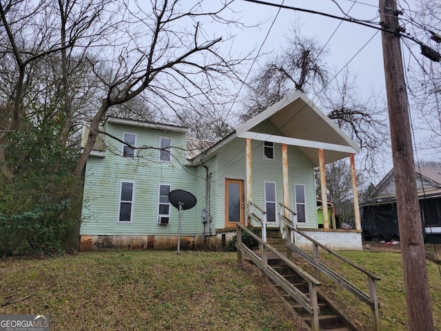 view of front facade with a front lawn