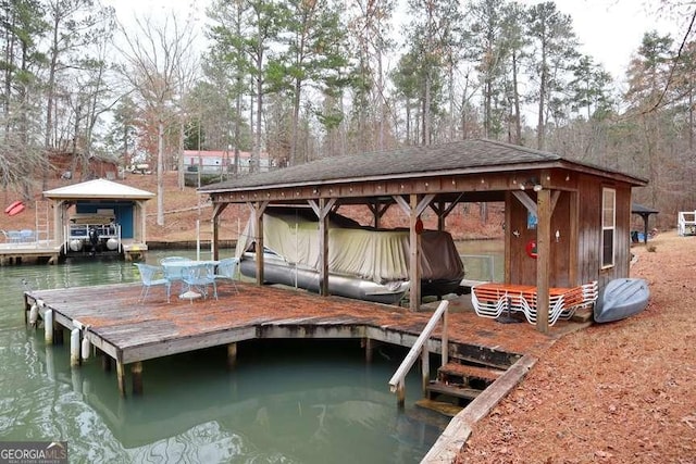 dock area featuring a water view