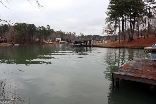 view of dock with a water view