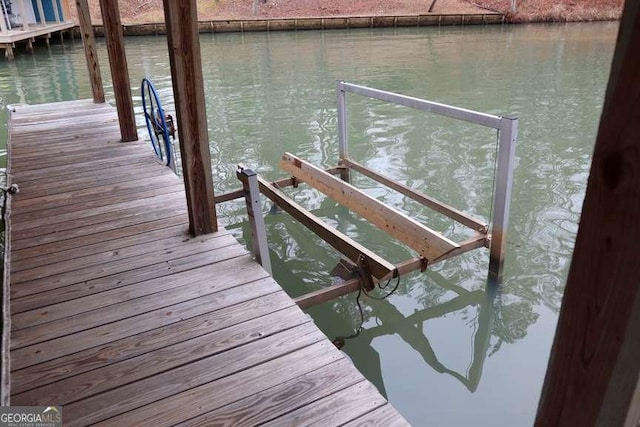 dock area featuring a water view