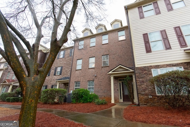 view of property featuring central AC unit