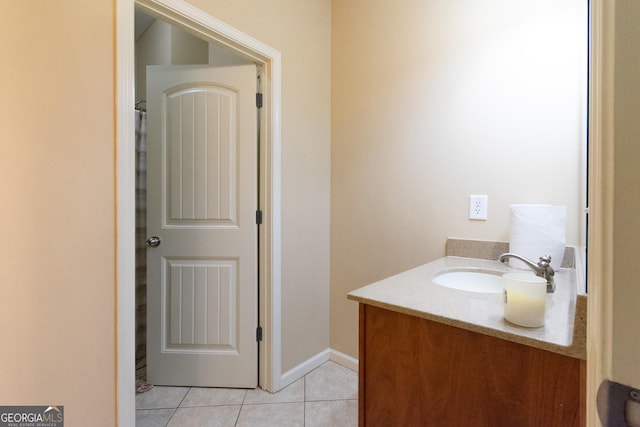 bathroom with vanity and tile patterned flooring