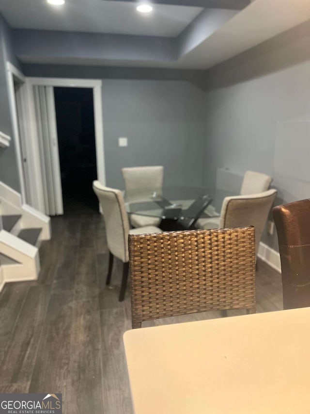 dining space featuring dark hardwood / wood-style flooring