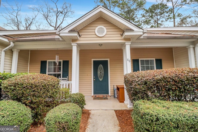 entrance to property with a porch