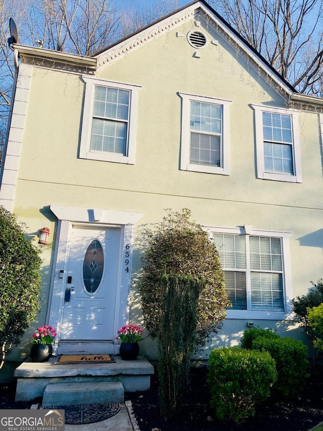 6594 Meadow Green Cir, Peachtree Corners, GA 30092 - view of front facade with stucco siding
