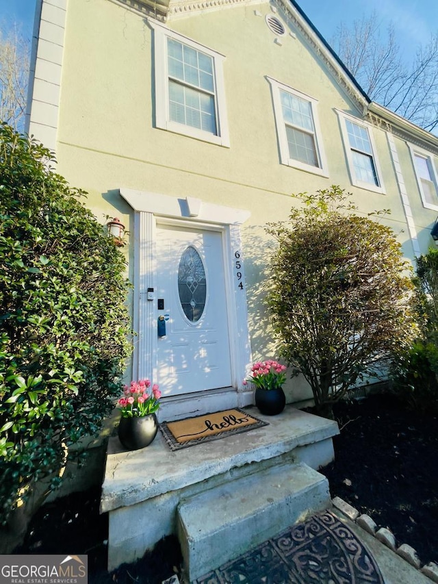 6594 Meadow Green Cir, Peachtree Corners, GA 30092 - entrance to property featuring stucco siding