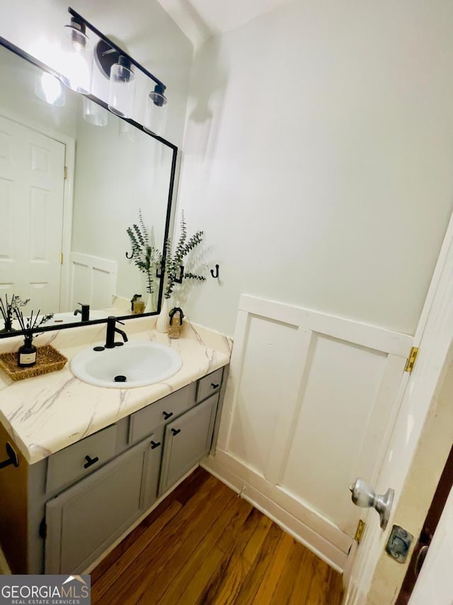 6594 Meadow Green Cir, Peachtree Corners, GA 30092 - bathroom with wood finished floors and vanity
